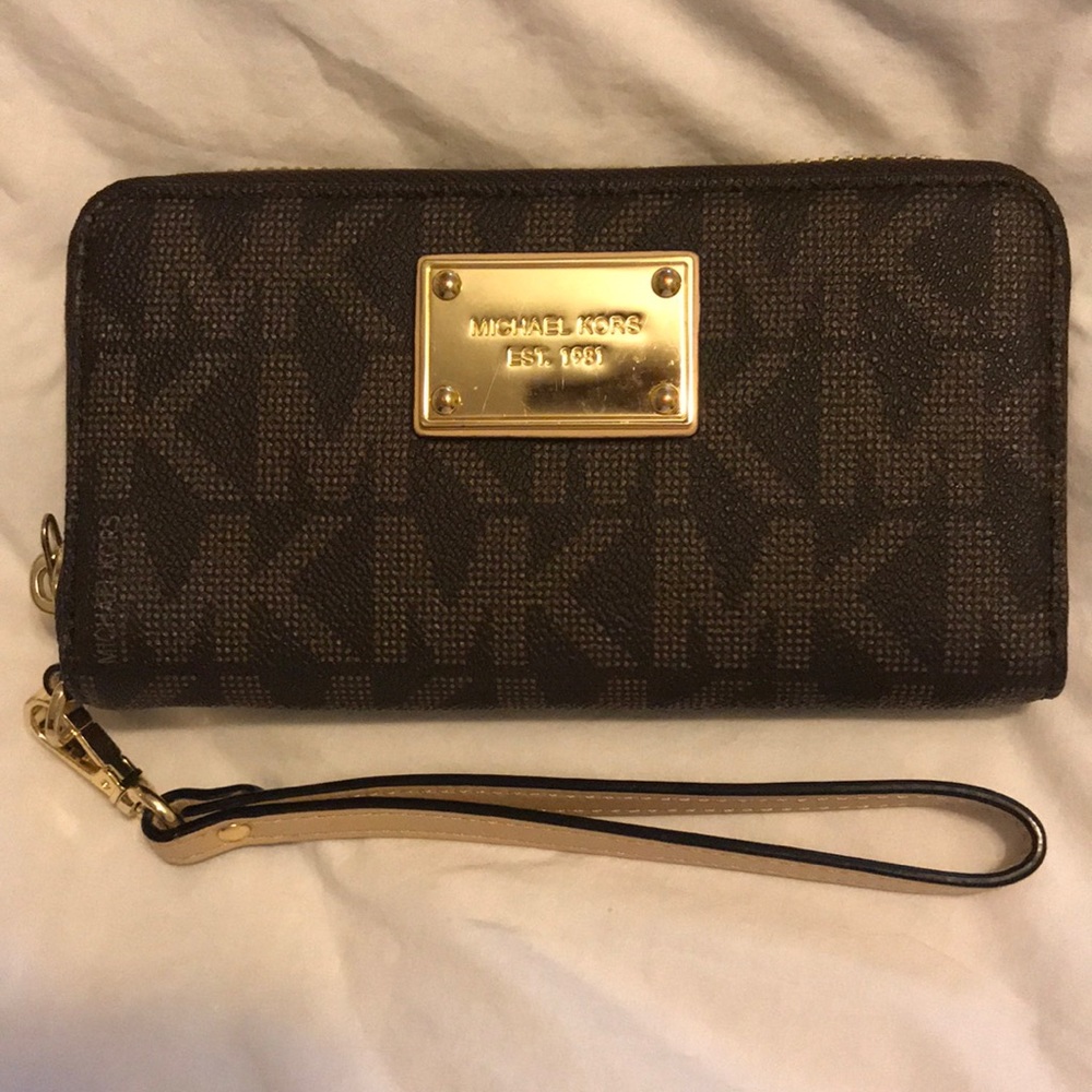 Authentic MK wristlet.
